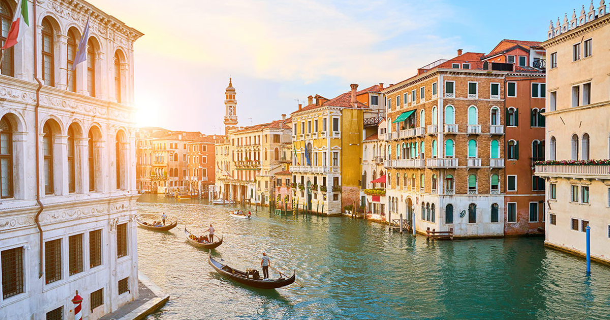 Italy city photo, river going through from city, boats in river
